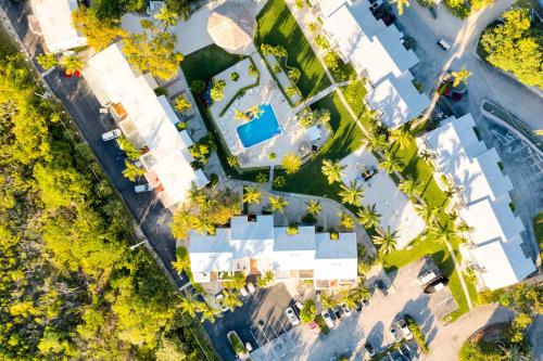 an overhead view of a house with a pool and trees at Kawama Yacht Club A4 in Key Largo