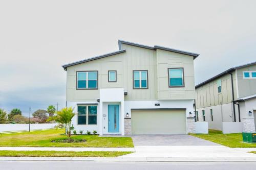 a large house with a garage at Casa De Playa in Melbourne Beach