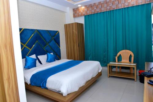 Postel nebo postele na pokoji v ubytování Hotel Asopalav