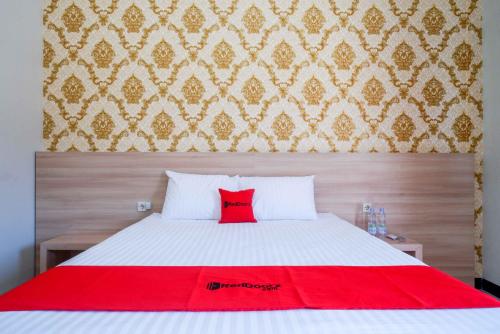 Кровать или кровати в номере RedDoorz Plus @ Jl Pemuda Pati