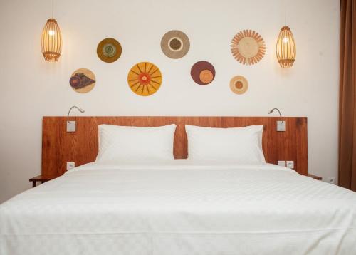 Vanila Hotel & Spa tesisinde bir odada yatak veya yataklar