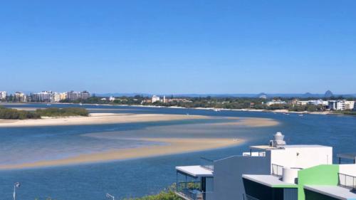 a view of a beach from a building at Amazing Views, Walk Everywhere! in Caloundra