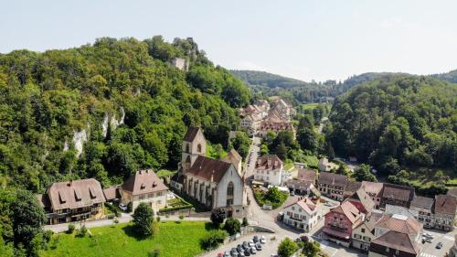 an aerial view of a town in the mountains at HOTEL RESTAURANT COLLIN in Ferrette