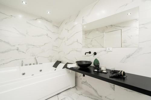 Een badkamer bij Marmur Suite