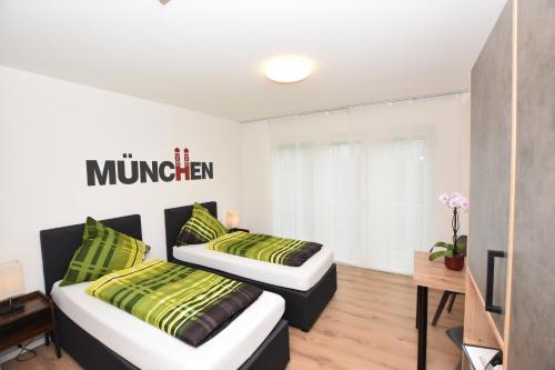 Ένα ή περισσότερα κρεβάτια σε δωμάτιο στο Boardinghouse Henschelstraße