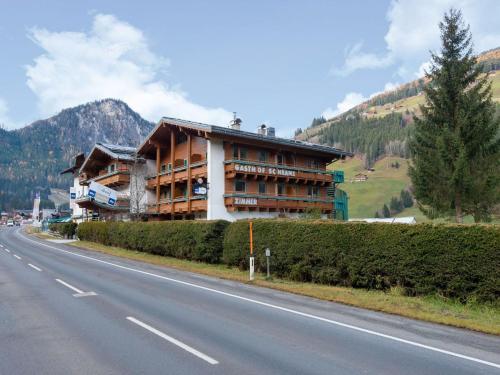 a large building on the side of a road at Apartment in Wald near Zillertal Ski Slopes in Wald im Pinzgau