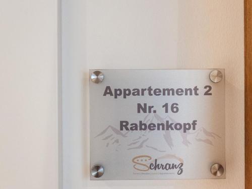 a sign on a door that reads apartment nr railroadotide at Apartment in Wald near Zillertal Ski Slopes in Wald im Pinzgau
