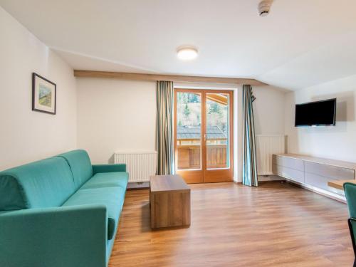 Televízia a/alebo spoločenská miestnosť v ubytovaní Apartment in Wald near Zillertal Ski Area