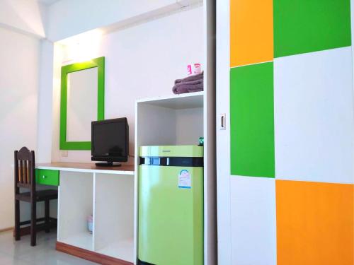 Una cocina o zona de cocina en โรงแรมวิจิตรพร อุบล VJP Hotel Ubon
