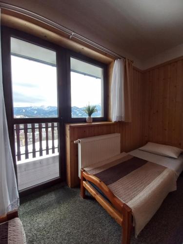 Cama o camas de una habitación en Niebiańska Grań