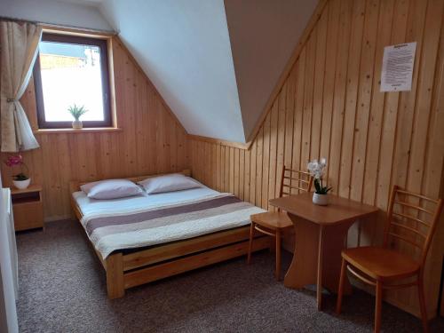 Cama o camas de una habitación en Niebiańska Grań