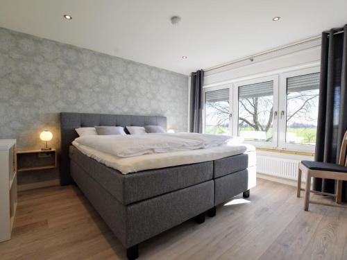 Postel nebo postele na pokoji v ubytování Luxury Villa in Megchelen with Sauna