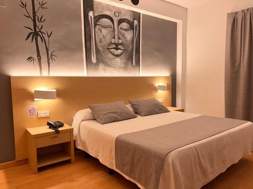 Postel nebo postele na pokoji v ubytování Hotel Golden