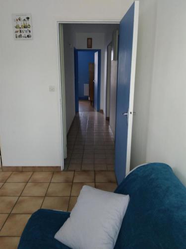 Ένα ή περισσότερα κρεβάτια σε δωμάτιο στο Gîte communal 149
