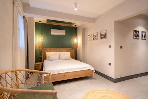 Katil atau katil-katil dalam bilik di Reddoors Suites Sea View