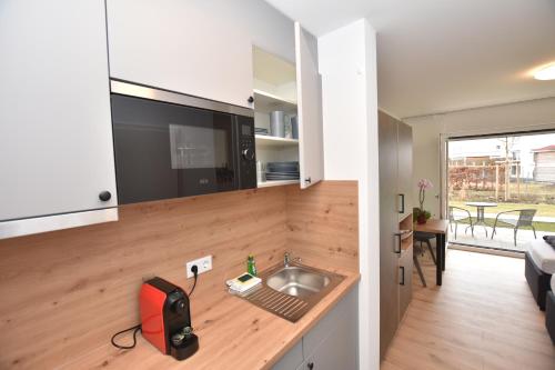 Η κουζίνα ή μικρή κουζίνα στο Boardinghouse Henschelstraße