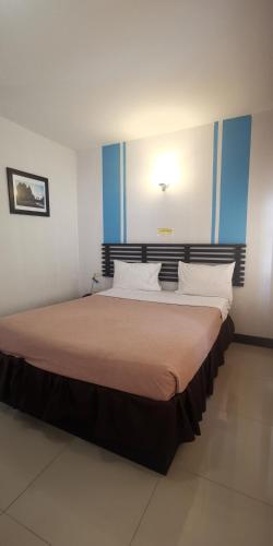 Cama o camas de una habitación en ไทยโฮเต็ล