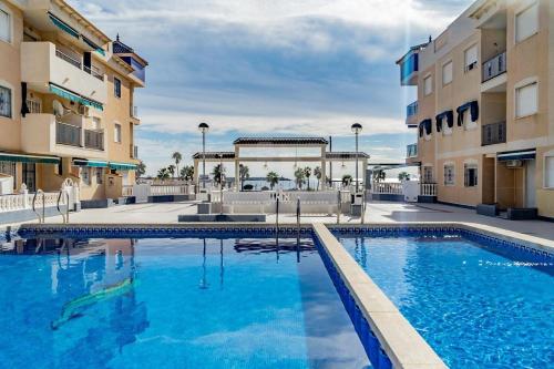 Bazén v ubytovaní Apartamenty Deluxe - Los Naufragos -Torrevieja Costa Blanca alebo v jeho blízkosti