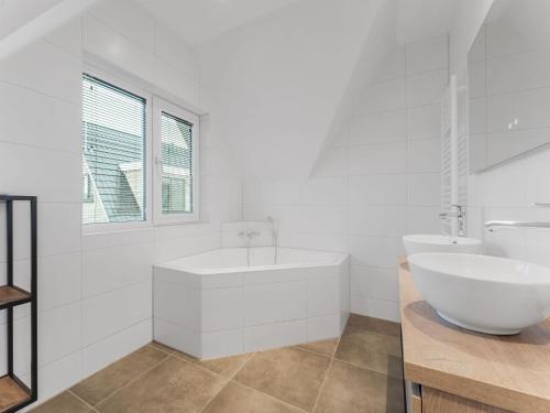 Kupatilo u objektu Wonderful Holiday Home in De Koog Texel with Terrace