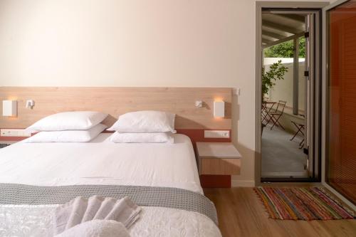 Krevet ili kreveti u jedinici u okviru objekta Relax in Kalamata