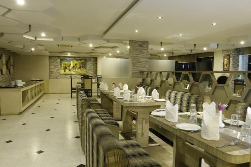 Restoranas ar kita vieta pavalgyti apgyvendinimo įstaigoje Hotel Mirage Regency