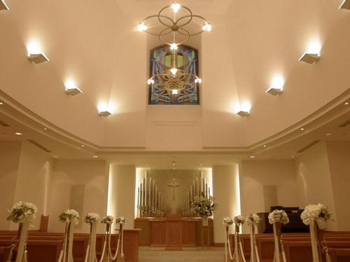 a church with a chapel with a stained glass window at Imabari Kokusai Hotel in Imabari