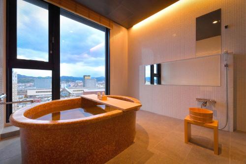 Kylpyhuone majoituspaikassa The Centurion Hotel & Spa Classic Izumo