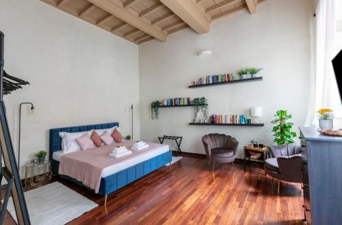 ローマにあるParione Apartmentのベッドルーム1室(ベッド1台付)