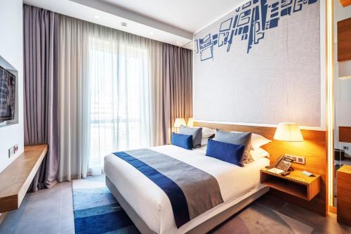 Cama o camas de una habitación en The Key Beirut