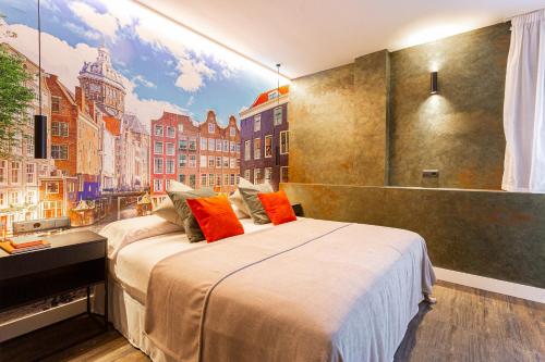 a bedroom with a large bed and a large window at Fly Rooms Madrid Airport in Madrid