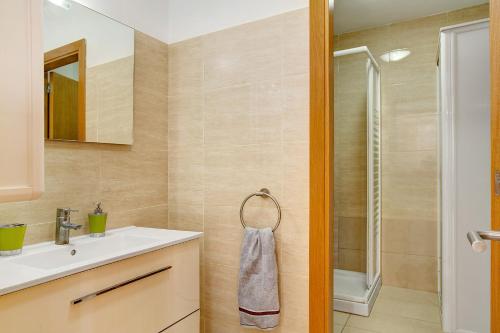 Ένα μπάνιο στο Apartamento Mogan Playa