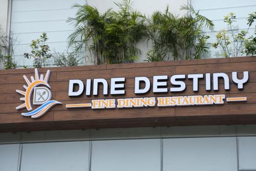 a sign for a line dining restaurant on top of a building at HOTEL OCEAN VISTA BAY in Visakhapatnam