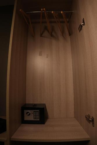 a room with a stage with a clock on it at HOTEL OCEAN VISTA BAY in Visakhapatnam
