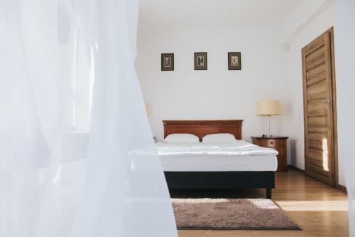 Ένα ή περισσότερα κρεβάτια σε δωμάτιο στο The K Guest House