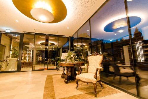 a room with a table and a chair in a store at Hotel-Restaurant Gollner in Lebring