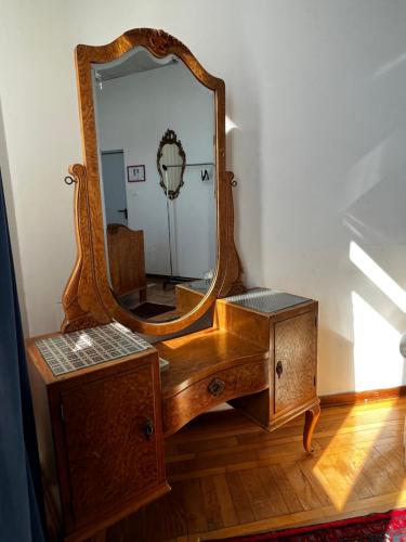 a dressing table with a mirror on top of it at Villa Tergeste in Trieste