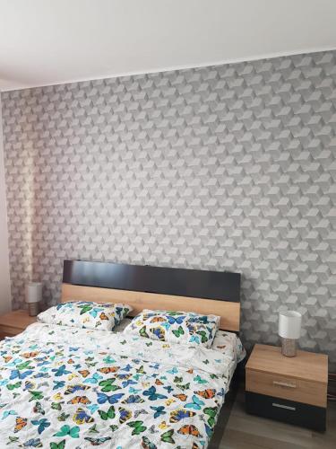 Ένα ή περισσότερα κρεβάτια σε δωμάτιο στο Ana Apartament