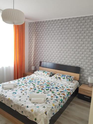 Ένα ή περισσότερα κρεβάτια σε δωμάτιο στο Ana Apartament