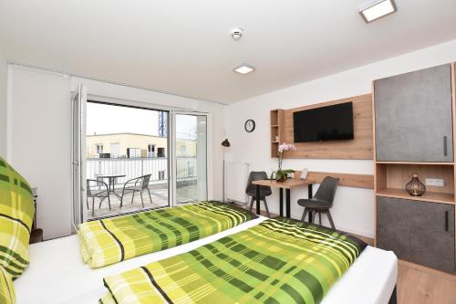Ένα ή περισσότερα κρεβάτια σε δωμάτιο στο Boardinghouse Henschelstraße
