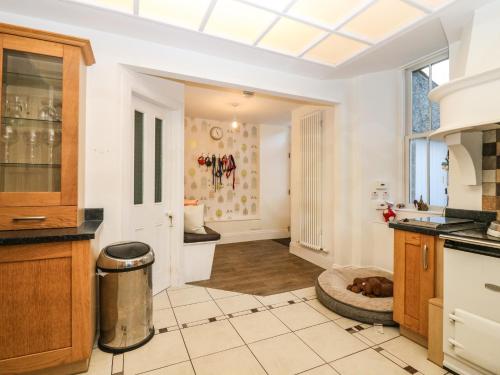 a kitchen with white walls and a ceiling at Mavisbank in Peterhead