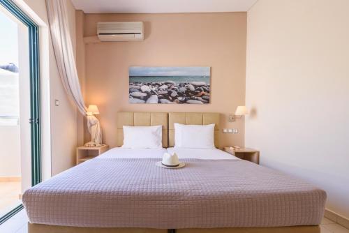Hotel Poseidonにあるベッド