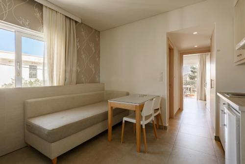 Postel nebo postele na pokoji v ubytování Poseidon Studios & Apartments