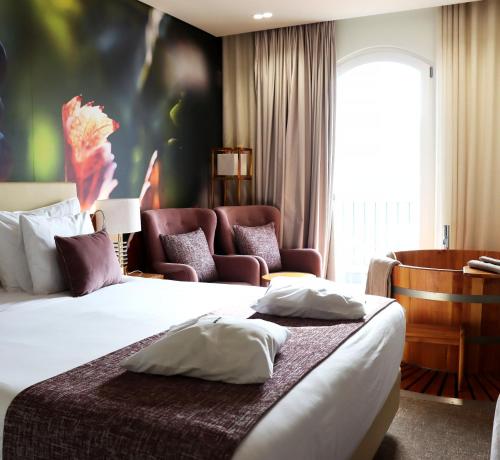 Cama ou camas em um quarto em Douro Castelo Signature Hotel & Spa