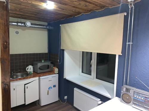 Kuchyň nebo kuchyňský kout v ubytování Riia 10, 2-bedroom apartment - 2 big beds 1 extra bed-parking free