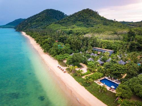 an aerial view of a beach with a rainbow at Andalay Beach Resort Koh Libong in Ko Libong