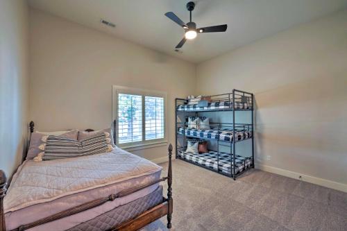 a bedroom with a bed and a ceiling fan at Modern Farmhouse with Patio, Grill and Mtn Views! in Ogden