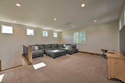 a large living room with a couch and a table at Modern Farmhouse with Patio, Grill and Mtn Views! in Ogden