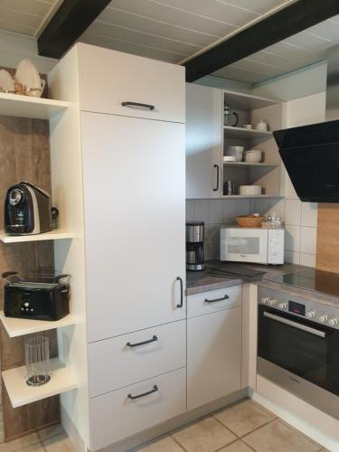 Kuchyň nebo kuchyňský kout v ubytování Haus Lerche