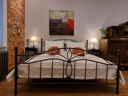 Ένα ή περισσότερα κρεβάτια σε δωμάτιο στο Apartamenty Bydgostia
