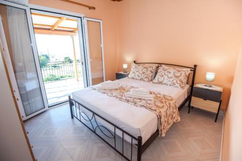 A bed or beds in a room at Anna-Maria House